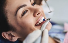 a patient undergoing dental cleaning in Petaluma