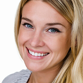 blonde woman smiling bright