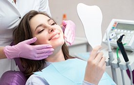 young woman getting cosmetic dentistry in Petaluma