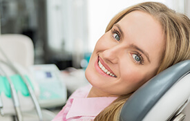 woman smiling brightly at camera