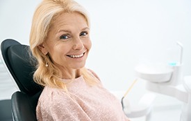 Woman smiling in the dental chair