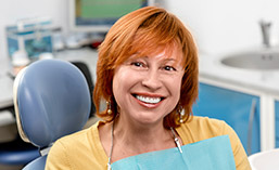 woman smiling in dental chair