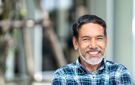 Man smiling after having root canaled therapy in Petaluma