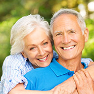 elderly couple smiling