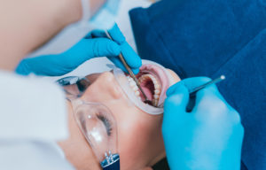 Woman receiving oral surgery