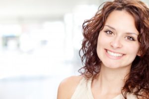 woman brown hair beautiful smile