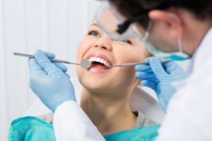 dental professional caring for patient