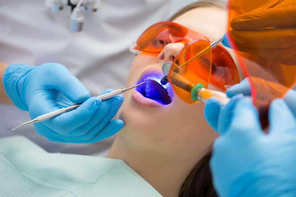 A woman getting a dental filling